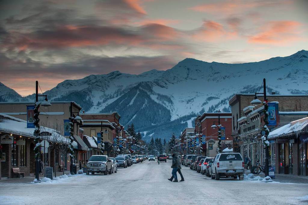 Downtown Fernie at dusk with a mountain landscape