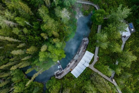 Couple enjoying Liard River Hot Springs