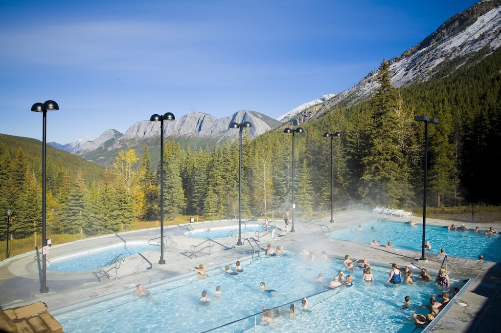 People swimming at Miette Hot Springs in Jasper National Park, Alberta